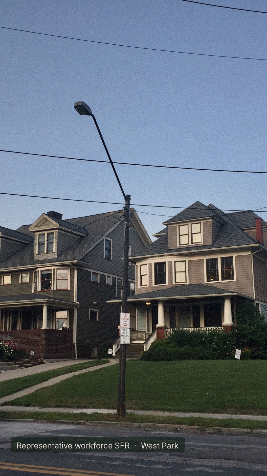 Cleveland West Park residential street with brick bungalows under afternoon sun, DSCR investor target neighborhood